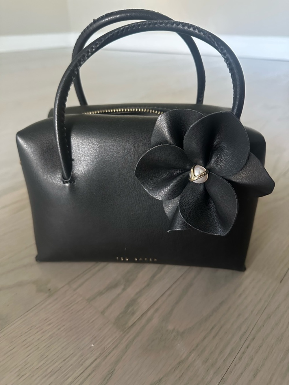 Ted Baker Black Leather Top-Handle Mini Bag with Floral Accent